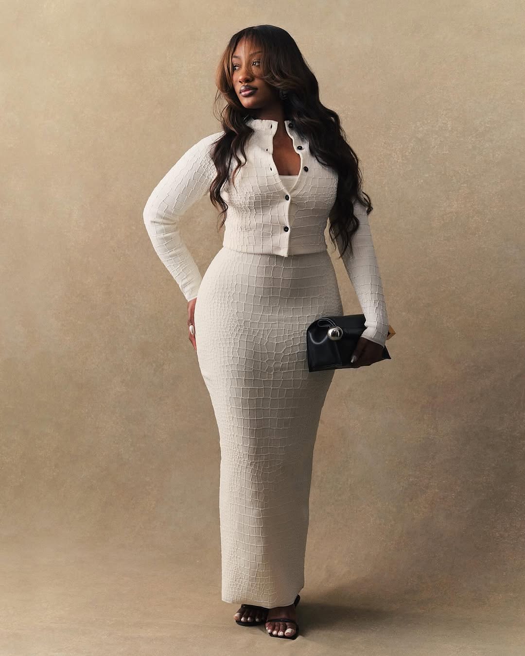 Tems Shuts Down Paris Fashion Week in an Iconic All-White Jacquemus Look