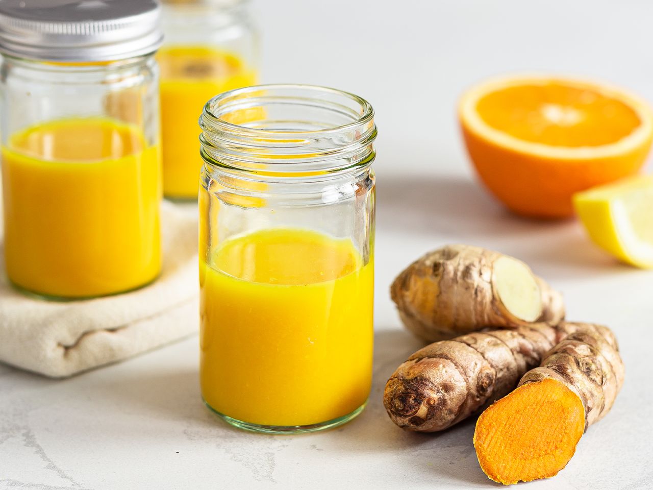 A Lot Of People Swear By This Ginger-Turmeric-Honey-Lemon Wellness Shot 