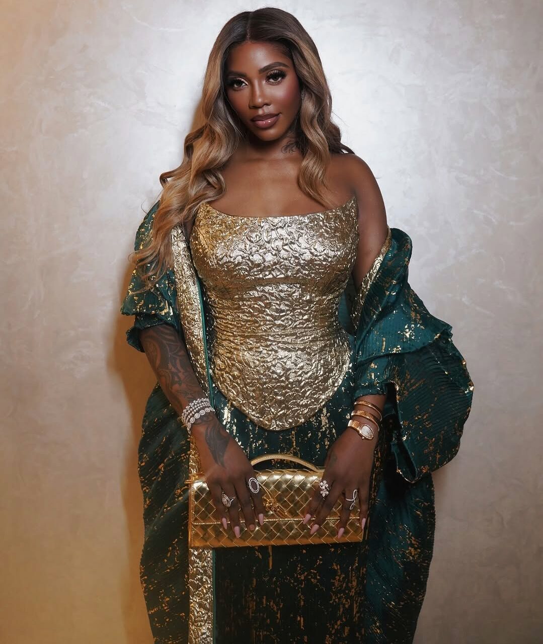 Tiwa Savage Radiates Royal Elegance in TUBO’s Glamorous Fashion | See Stunning Photos